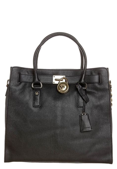 sac a main noir et or michael kors|Michael Kors.